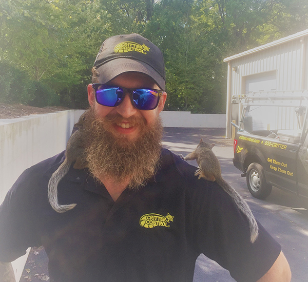 Critter Control Triangle Worker with Squirrels